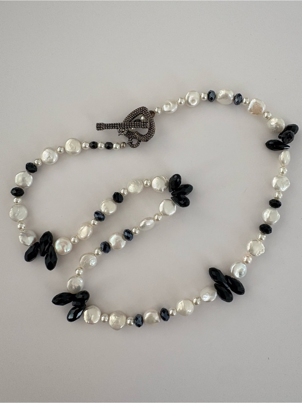 Elegant White Pearl and Black Bead Necklace
